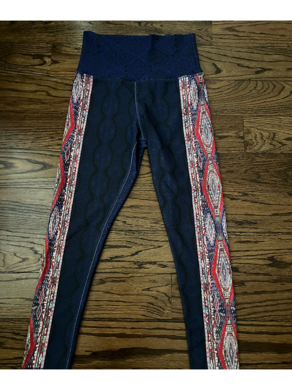 Evolution And Creation Leggings with Red Aztec Print Side Panels